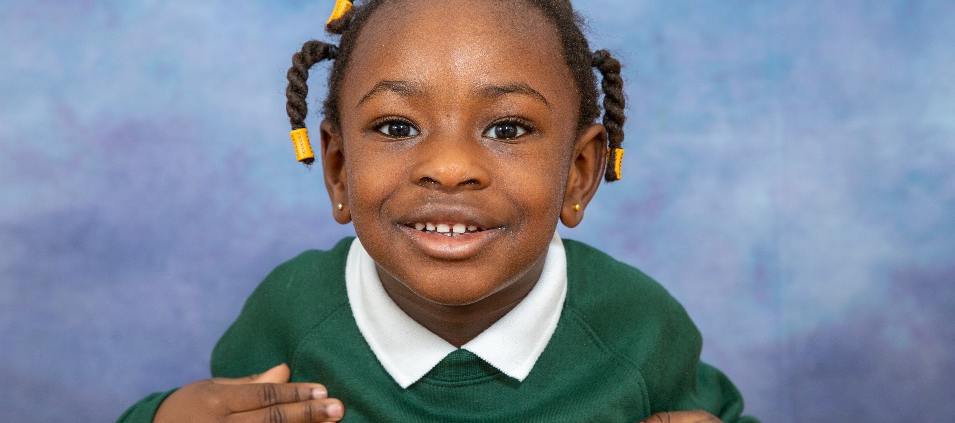 Beautiful little girl with special needs having her formal school photography session - Tiverton School, Coventry
