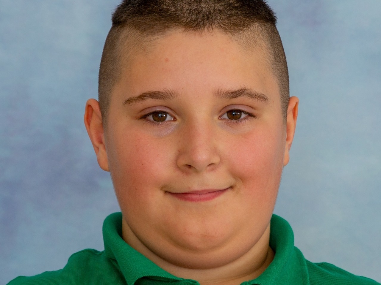 Model looks from this handsome autistic boy during his SEN school photograph session