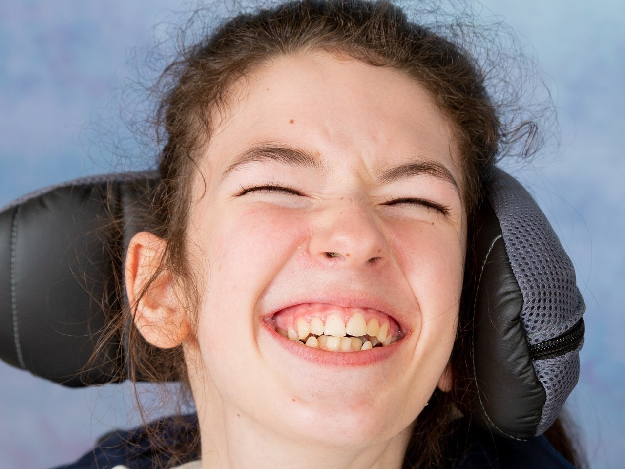 Gorgeous young lady in a wheelchair having her  SEN school photography session