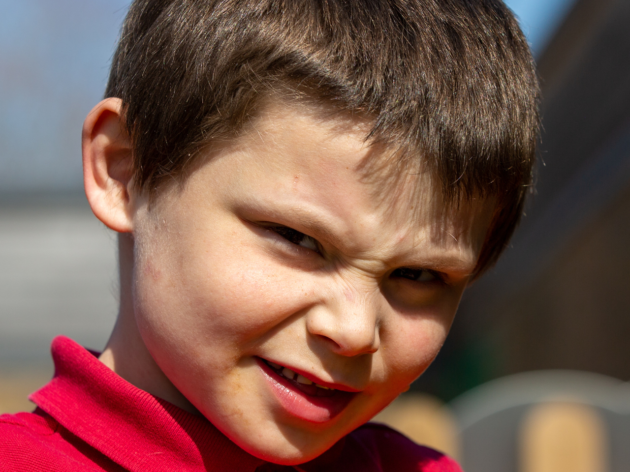 Model pose from this handsome young man in his special needs school photo session in Suffolk
