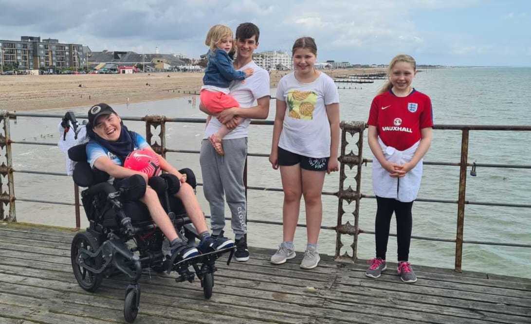 The Merry family on holiday in Bognor Regis enjoying the wheelchair friendly pier