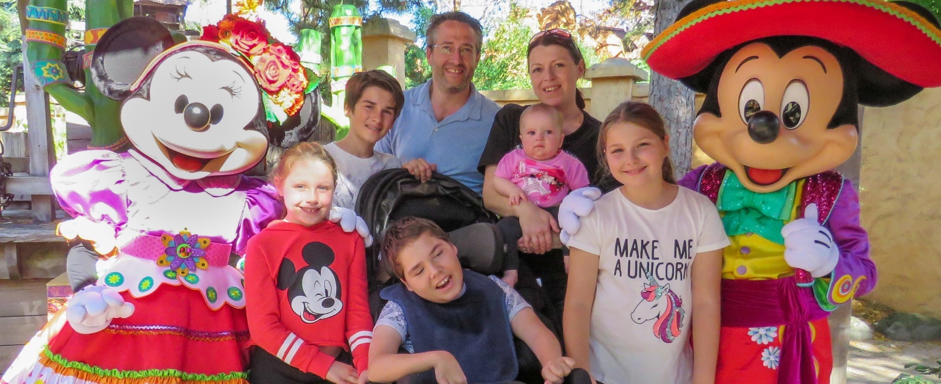Peter and Karen Merry enjoying a family holiday with their five children.