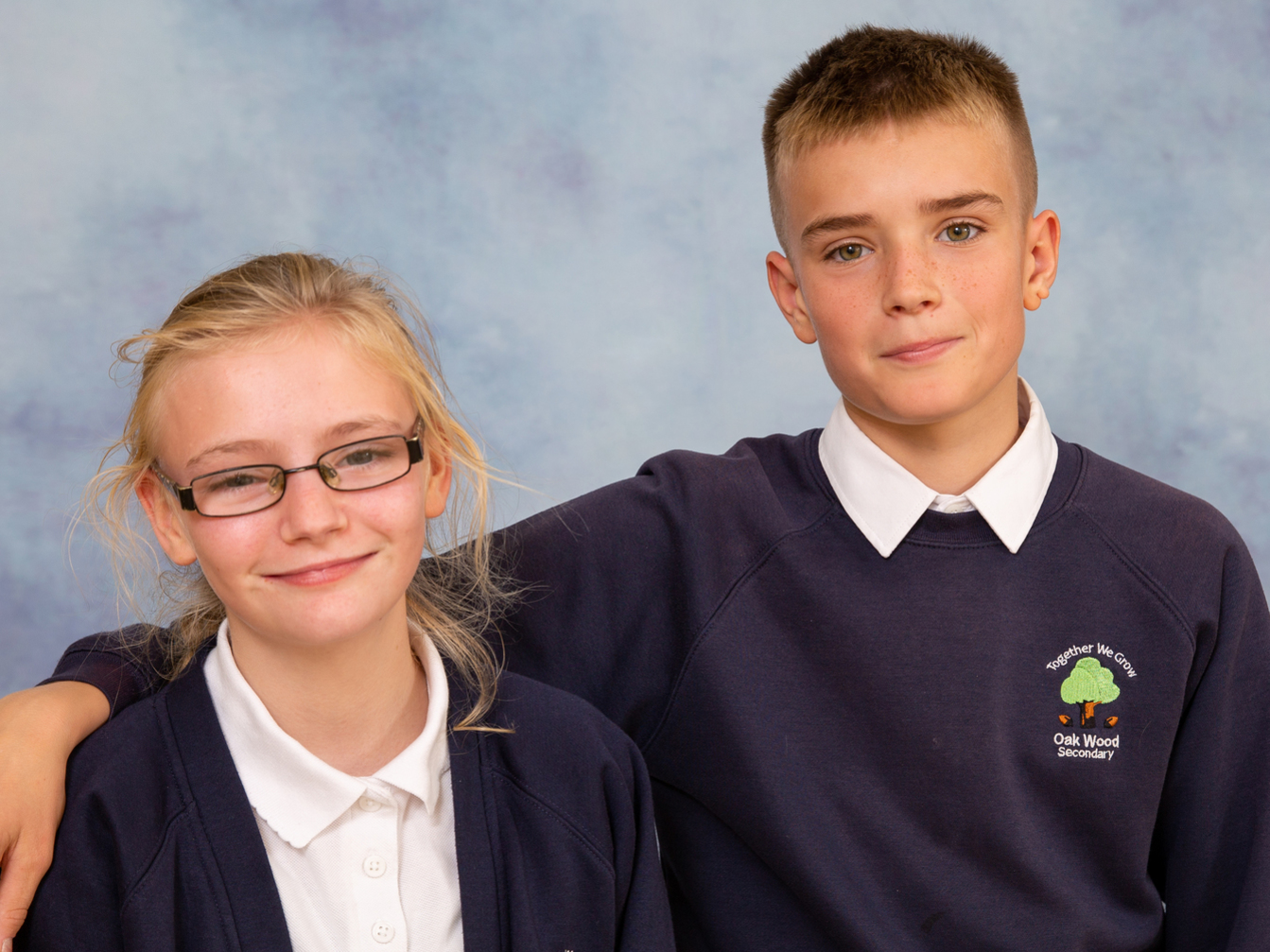 Brother and Sister love in this sibling school portrait