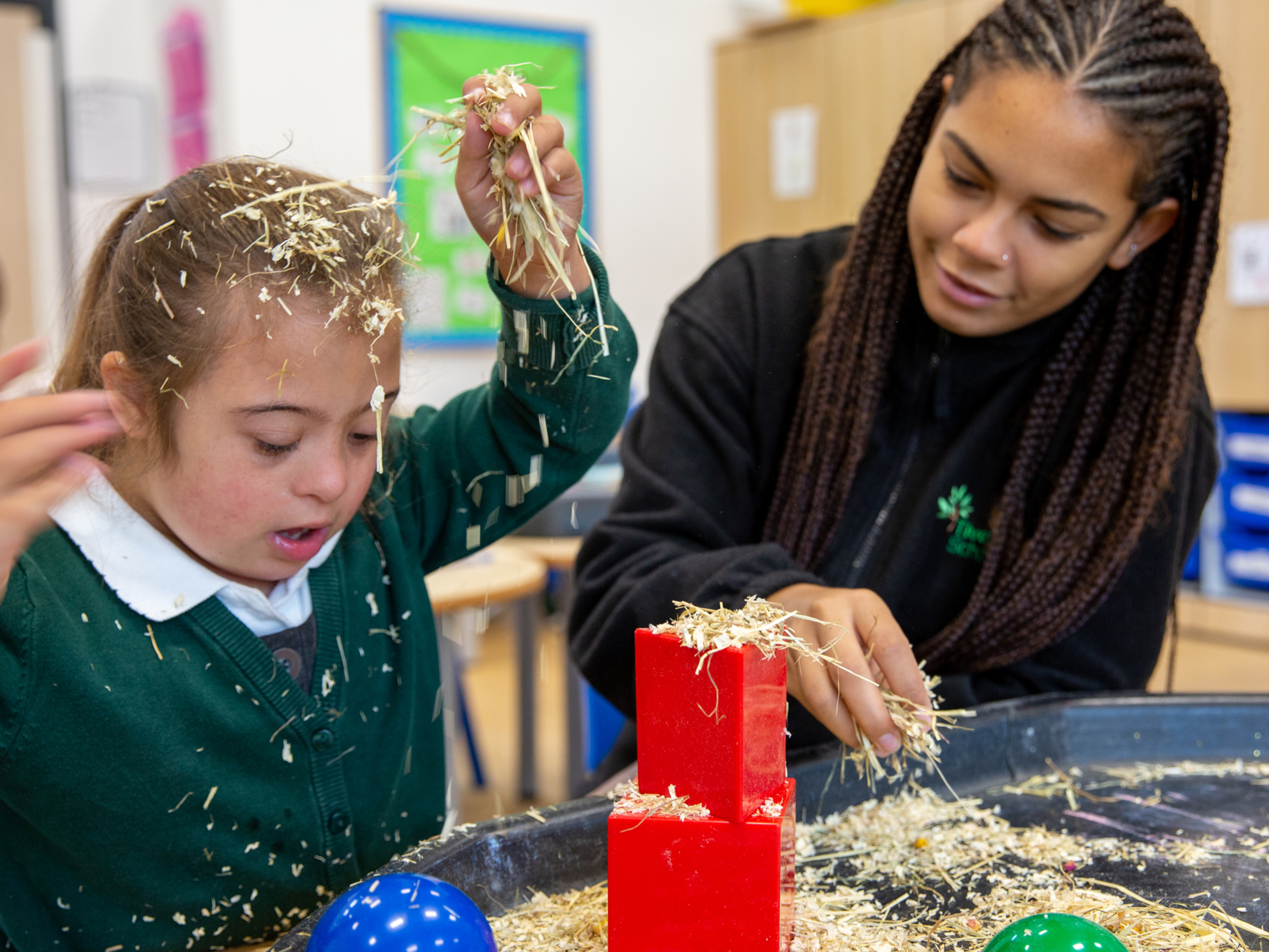 Sensory play with hay at this SEN school in Coventry